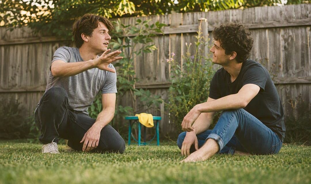 Friends rehearsing a backyard movie scene