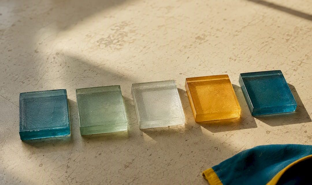 Five colored tiles arranged in sequence