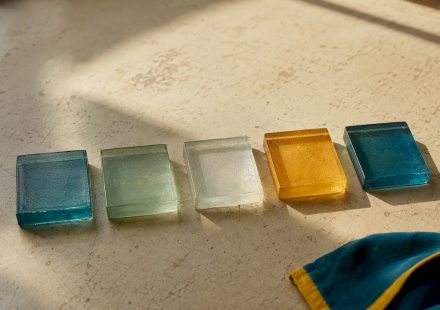 Five colored tiles arranged in sequence